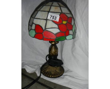 A table lamp with Tiffany style shade.