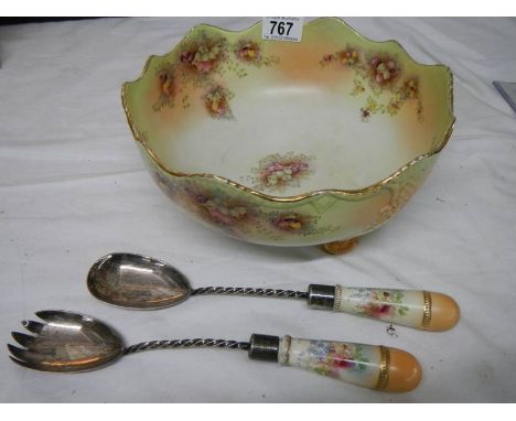 An early 20th century Carlton ware salad bowl with servers.
