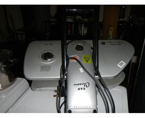 An E + R classic ultra compact press model SP-16, teflon no-stick, presses wool, silk, nylon, cotton etc.,