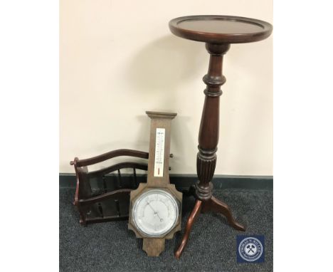 A reproduction mahogany wine table, a magazine rack and an oak barometer