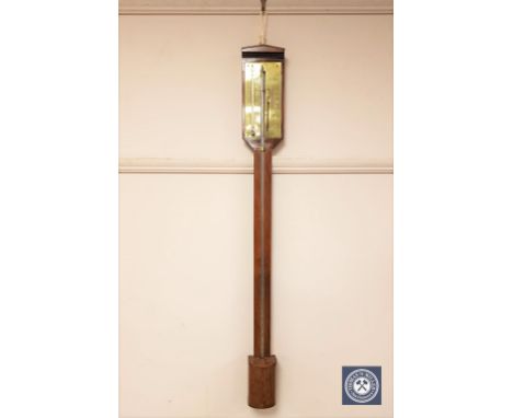 A continental mahogany stick barometer, height 94 cm.