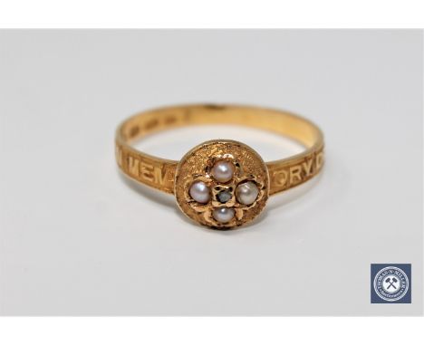 A good 18ct gold Victorian pearl and diamond memoriam ring.