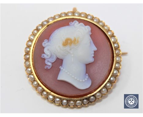 A good quality Victorian stone cameo and pearl brooch, diameter 34 mm.