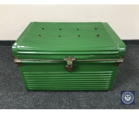 A painted tin trunk