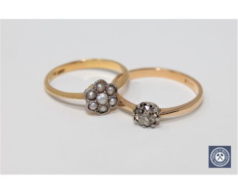 Two 18ct gold rings, one solitaire approximately 0.4ct, the other a pearl cluster. (2)