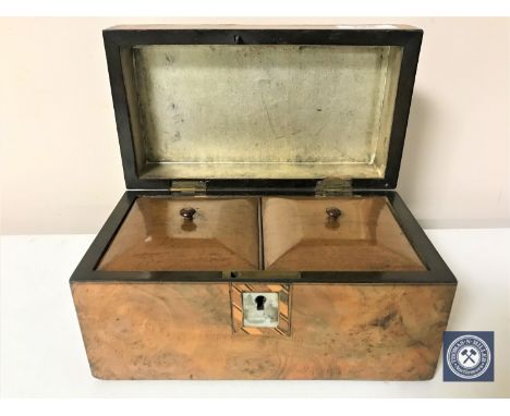 A Victorian inlaid walnut fitted caddy.