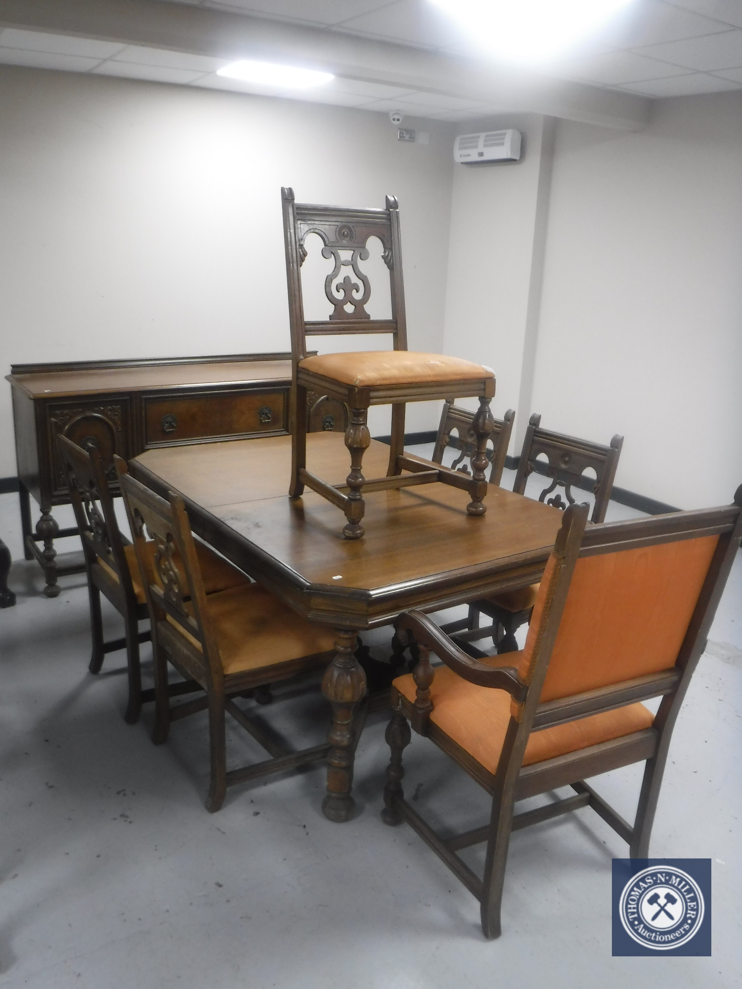 An American Berkey & Gay Carved Oak Dining Room Suite Comprising 