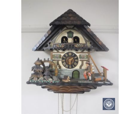 A cuckoo clock with weights