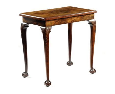 A WALNUT SIDE TABLE IN GEORGE II STYLE the quarter veneered top with cross and feather banding, with a caddy moulded edge wit