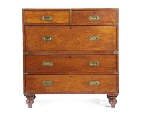 A VICTORIAN TEAK CAMPAIGN CHEST BY ARMY &amp; NAVY, LATE 19TH CENTURY in two halves, with two short and three long drawers, w