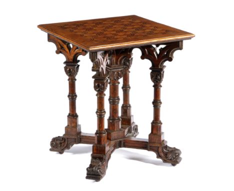 A VICTORIAN GOTHIC OAK OCCASIONAL TABLE IN THE MANNER OF JULIUS YACOBY, C.1870-80 the square top inlaid with interlaced star 