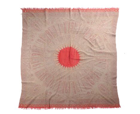 A VERY FINE KASHMIR SHAWL NORTH WEST INDIA, 19TH CENTURY the field of radiating boteh, centred by a plain scarlet panel, fram