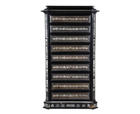 AN ITALIAN EBONY EBONISED AND IVORY CHEST IN THE MANNER OF FERDINANDO POGLIANI, MILAN, 19TH CENTURY marquetry inlaid with rin