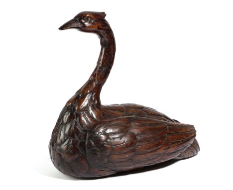 A VICTORIAN TREEN PINE TABLE SNUFF MULL LATE 19TH CENTURY carved in the form of a of swan, its wings lifting to reveal a pair