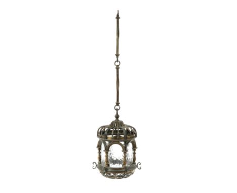 A GILT BRASS HALL LANTERN LATE 19TH CENTURY of hexagonal form, the six arched panes beneath an ogee top with suspension hoop 
