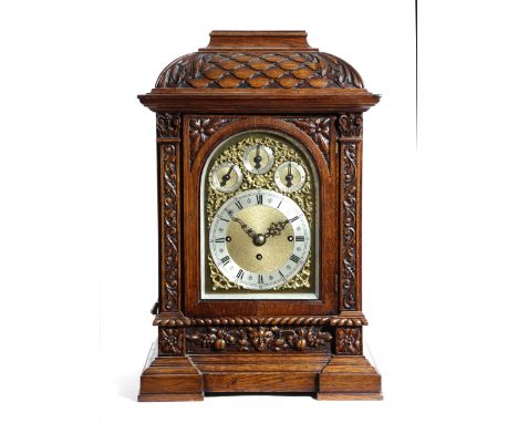 A VICTORIAN OAK CHIMING BRACKET CLOCK LATE 19TH CENTURY the brass eight day three train repeating movement chiming on eight b