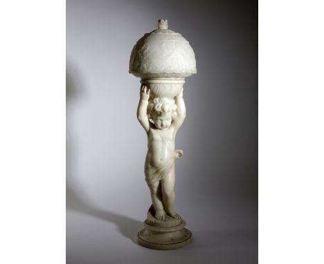 AN ITALIAN ALABASTER FIGURAL LAMP AND SHADE BY ANDREINI, LATE 19TH CENTURY modelled as a classical cherub holding a bowl and 