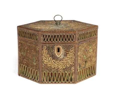 A GEORGE III QUILLWORK OR SCROLLED PAPER TEA CADDY C.1800 of hexagonal form, with string edging, floral and swag decoration, 