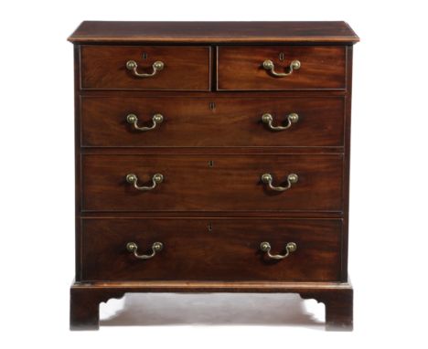 A GEORGE III MAHOGANY CHEST C.1770 of two short and three long drawers on shaped bracket feet 101.8cm high, 98cm wide, 52.2cm