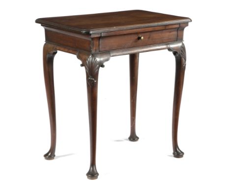 A MAHOGANY SIDE TABLE IN GEORGE II STYLE the caddy moulded top above a frieze drawer on shell capped cabriole legs and pad fe