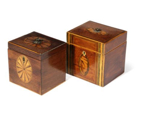 A GEORGE III MAHOGANY TEA CADDY C.1800 of rectangular form, inlaid with fan and shell paterae, the lidded interior with a lat