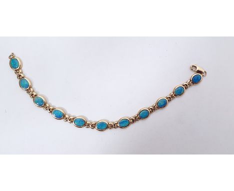 9K gold and opal doublet bracelet with oval links 