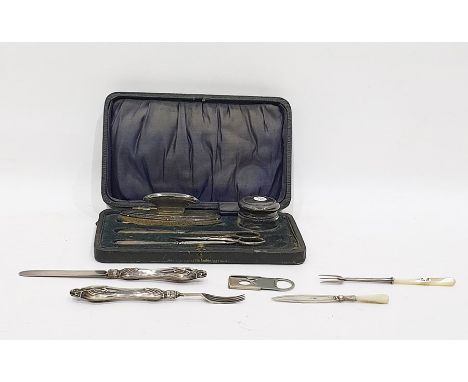 Silver backed lady's manicure set comprising nail buffer, scissors, silver-capped jar, etc, in a fitted case, a small silver-