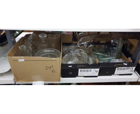 Three boxes of mixed glassware to include fruit bowls, decanter, large wine glasses and some vintage bottles 