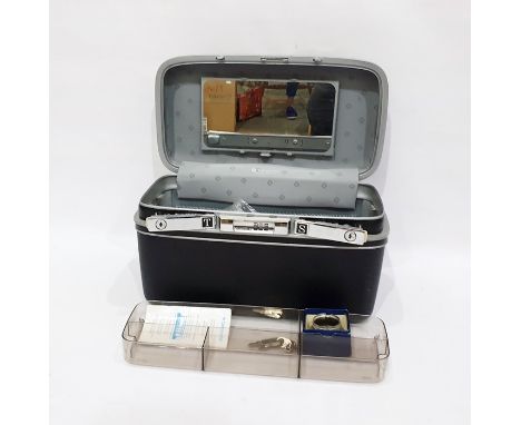 Camera tripod and a Kodalux 3 electronic flash in a Samsonite hinged case with combination lock 