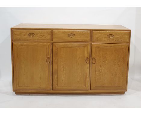 Modern light elm Ercol sideboard of three doors above three cupboards doors 155 x 94 cmsCondition ReportThe depth is approx 4