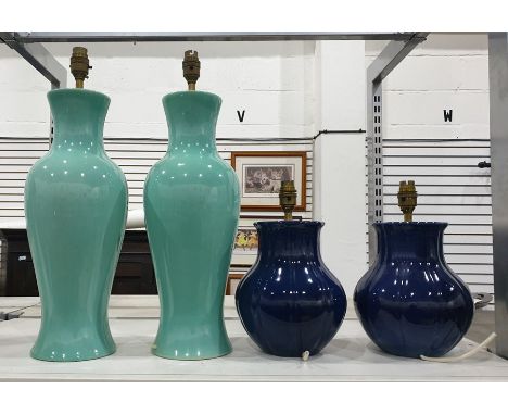 Two pairs of ceramic table lamps, one in royal blue the other in sage green Condition ReportThe smaller lams are 29.5 cm tall
