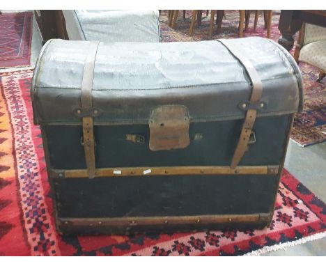 Leather covered wicker dome topped trunk