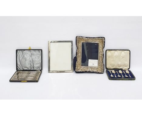 Modern Britannia silver standard rectangular photograph frame with scrollwork border, London 1967, on trestle support, 25cm x