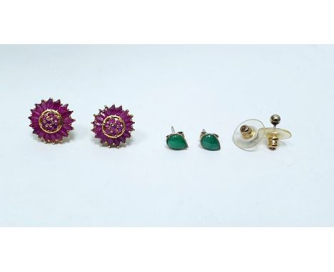 Pair gold-coloured metal and pink stone cluster earrings, the stones probably ruby, pair jade set stud earrings and another p