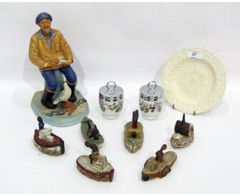 Royal Doulton 'The Seafarer' figure modelled seated on a rocky plinth, printed HN2455, a Welsh creamware small circular plate