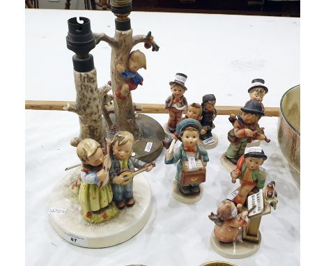 Collection of Hummel figures, 20th century, printed and impressed marks, to include figures of musicians, a postman, singers 