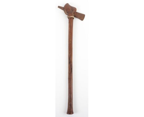 Southern Africa Zulu? Axe, with steel downward facing axe head, wooden haft with swollen end. Some wear and cracks to the woo