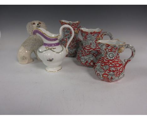 Three graduated Mason's Ironstone Jugs with kylin decoration on an orange ground 4 1/2in - 6in H, a Royal Worcester helmet sh