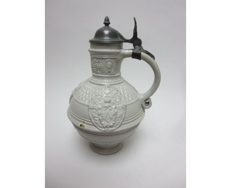 A 16th Century style German white stoneware Stein with moulded coats of arms and inscription on neck "Lvcas De Waela 1594" hi