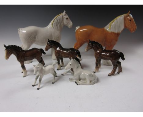 Two Beswick figures of Shire Horses, a dapple grey and a light chestnut, three brown foals and two dappled grey foals