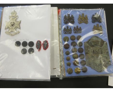 Three Wiltshire Regiment Cap Badges, four buttons, pair of brass shoulder badges and a cloth badge; a 21st London Regiment ca