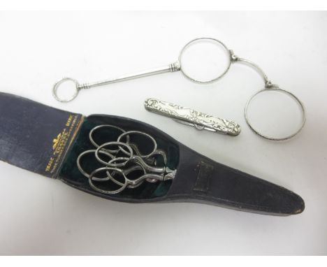 An Edward VII silver cased folding Knife and Button Hook, Birmingham 1905, pair of silver cased Pince-nez and a set of three 