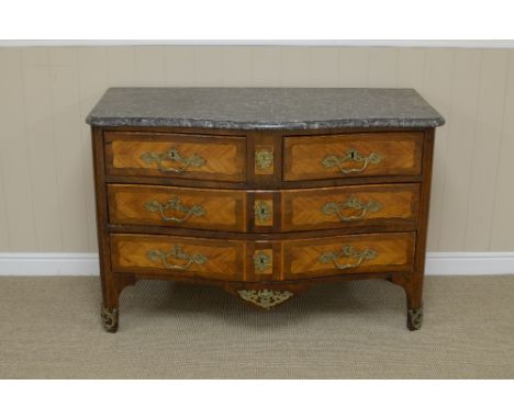 An antique kingwood Commode in the Regence manner with grey veined marble top above two short and two long serpentine cross-b