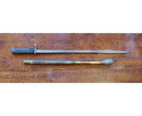 A WW1 British officers trench club with lead head and a WW1 German Quill back bayonet.