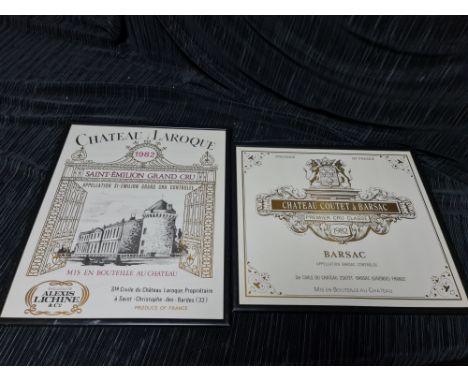 Two framed French Chateau wine promotional prints