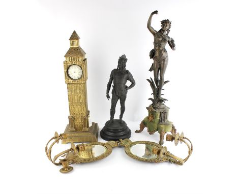 Cast metal clock in the form of Big Ben, pair of girandoles, and two spelter figuresCondition Report:  The clock is 55cm high