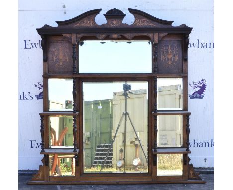 An Edwardian rosewood and inlaid mirror back set of shelves, formerly part of a larger item, the central mirror enclosed by s