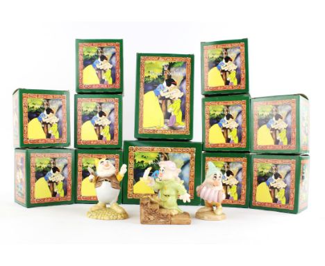 A collection of Snow White and the Seven dwarf figures by Royal Doulton, to include Sleepy, Dopey, Grumpy, Doc with lantern, 