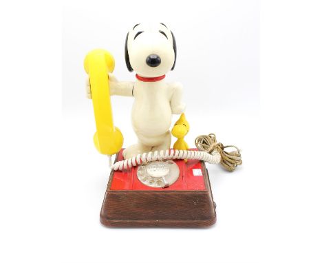 A vintage 'Snoopy' character telephone, detailed to the base 'British Telecom supplied TSR8014A EET81/1.  34cm high and one f