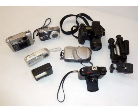 A quantity of cameras to include Sony Cyber-shot digital camera, Panasonic TZ2 lumix, Konica Minolta Dimage A2, Canon IXUS Z9